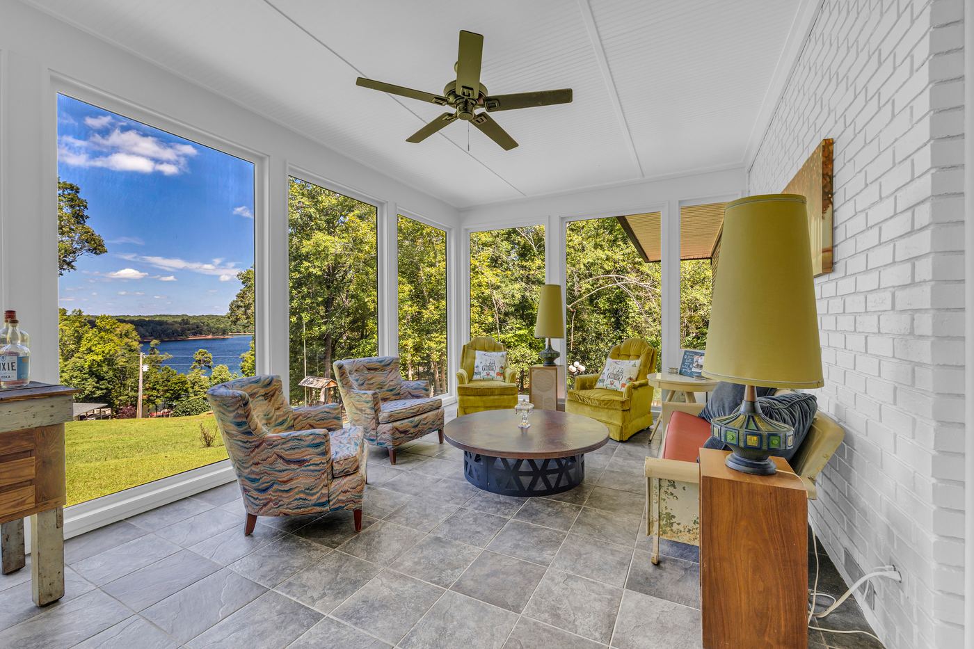 The sunroom with Lake Hartwell through the windows